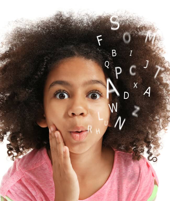 little girl with book and alphabet letters speech therapy concept